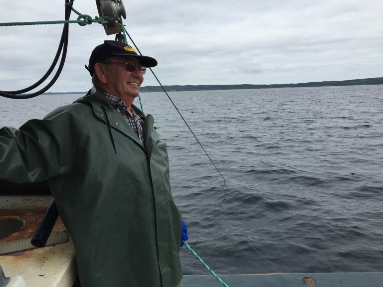 Aubrey Payne on the water testing cod pots.